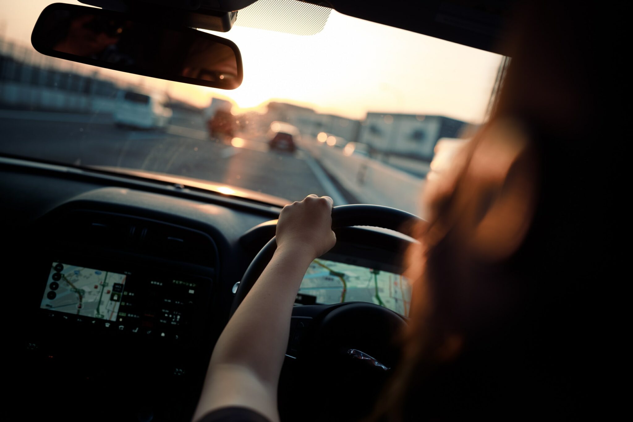 an image of a person driving a car for the page collecting bank transfer payments as a driving instructor